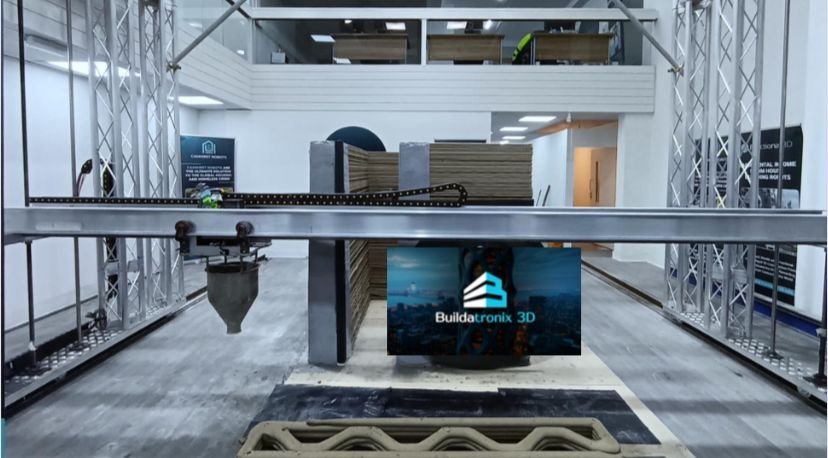 BT500 gantry printer with printed wall sample in the Manchester showroom