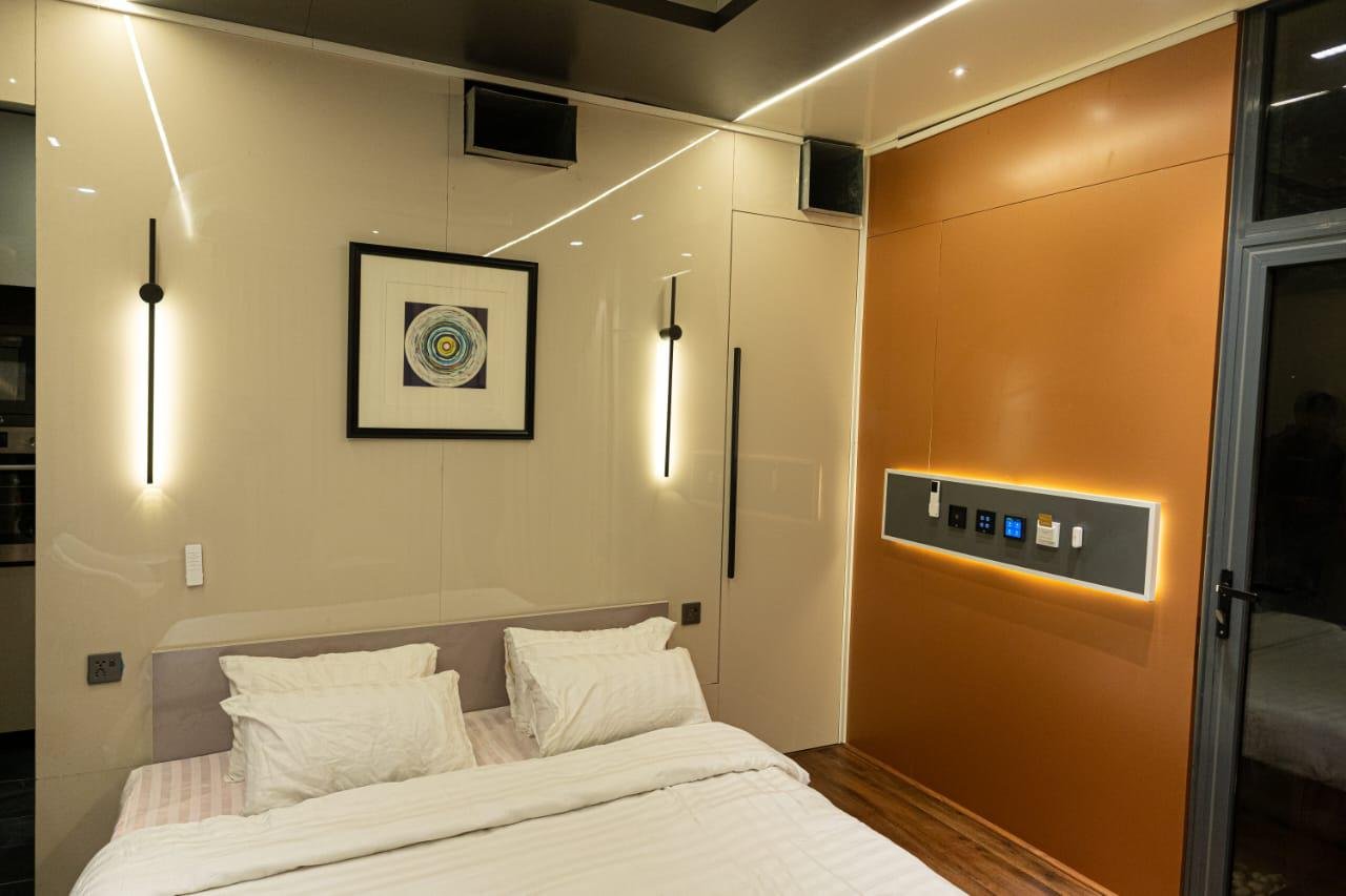 Capsule bedroom with wall lights